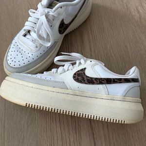 Nike Low-Top Leather Sneakers in White with Brown Swoosh